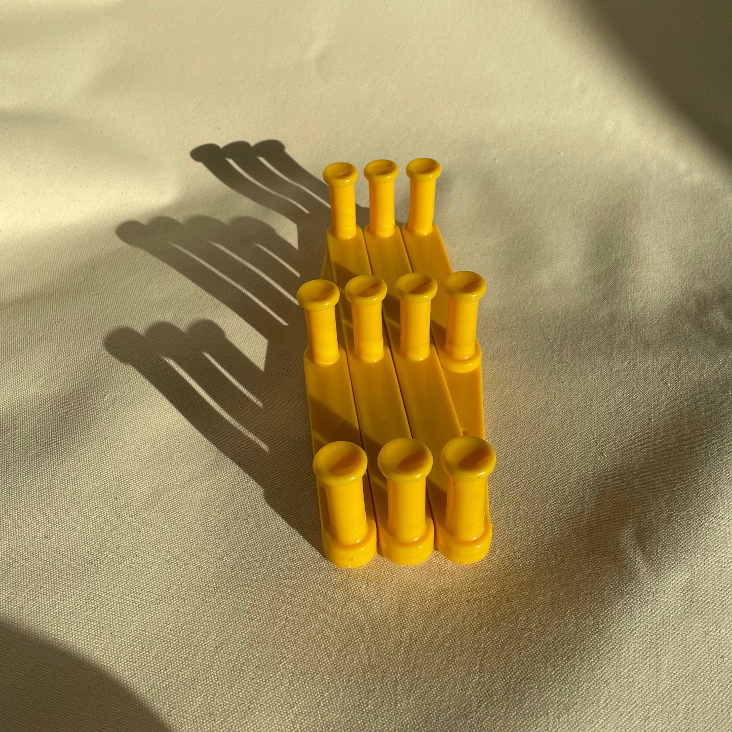 Vintage Yellow Plastic Expandable Peg Rack